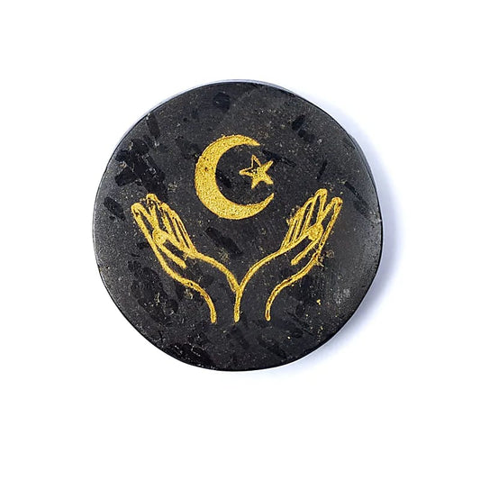 Engraved mineral disc black tourmaline hands, moon, and star