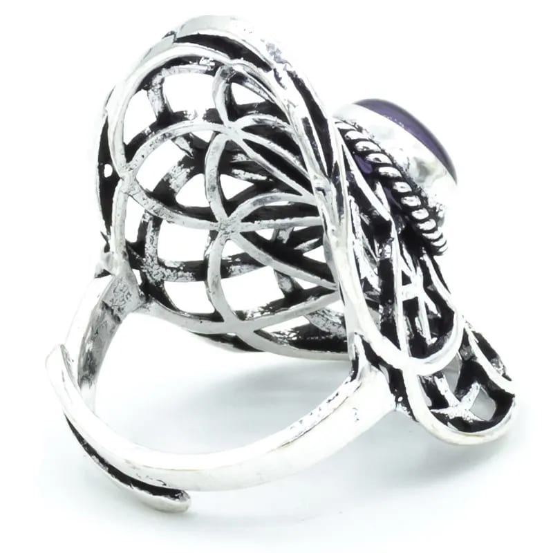 Silver-colored Seed of Life ring with amethyst