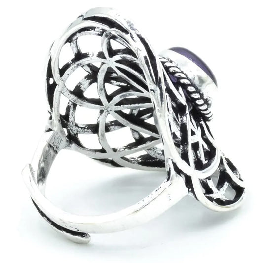 Silver-colored Seed of Life ring with amethyst
