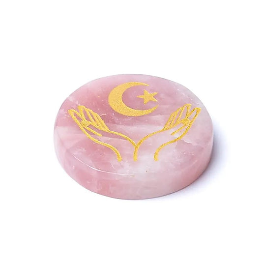 Engraved mineral disc rose quartz hands, moon and star