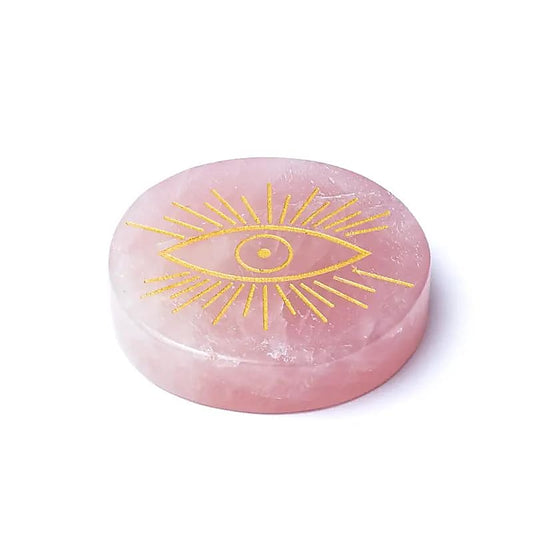 Engraved rose quartz mineral disc all-seeing eye